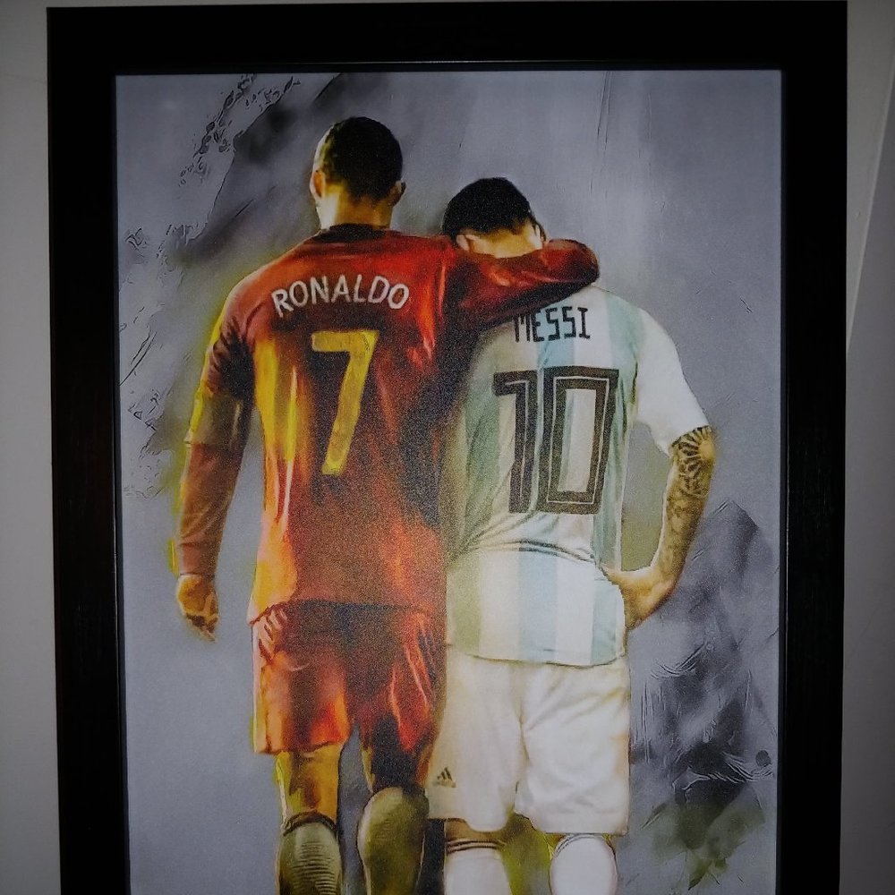 Laminated framed print - Ronaldo and Messi